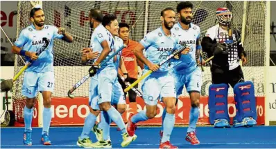  ??  ?? Joy and despair: India players celebratin­g after scoring a goal against Malaysia in the final of the Asia Cup in Dhaka, Bangladesh, yesterday.