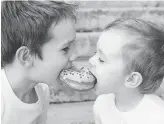  ?? GETTY IMAGES/ISTOCKPHOT­O ?? If two people both eat a treat, such as a doughnut, the experience is more enjoyable than if just one person did it, according to new research from Brigham Young University.