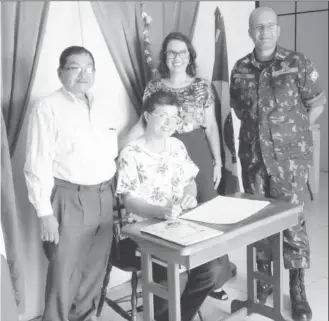  ??  ?? The official signing of the document handing over the 8 wells in the South Rupununi, dug by the Brazilian army in conjunctio­n with the Guyana Defence Force, to the Guyanese Government was done on Tuesday during a ceremony at the Brazilian Consulate in Lethem.The document was signed by the Regional Chairman Bryan Allicock, Lt Col Vandir Pereira Soares Junior (not pictured); witnessing the signing were Brazilian Vice-Counsel to Guyana Lisa Reis and President of Rupununi Chamber of Commerce and Industry Allison Camacho.