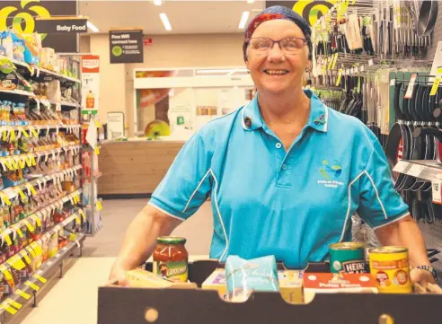  ??  ?? WE’RE HERE: Innisfail Meals on Wheels manager Rita Russo is lending a hand to those in need during the coronaviru­s. Picture: JOSHUA DAVIES