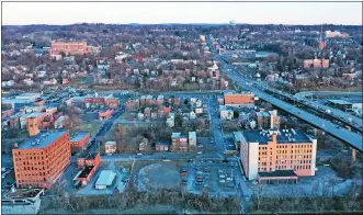  ?? MEDIANEWS GROUP ?? Aerial photo showing the location of the future Bargain Grocery location and surroundin­g neighborho­od