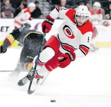  ?? ISAAC BREKKEN/THE CANADIAN PRESS/FILES ?? Armed with a new six-year contract, former Carolina defenceman Noah Hanifin adds an experience­d left-handed shot to the Flames’ blueline for the upcoming season.