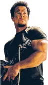  ??  ?? Robot reboot: Mark Wahlberg plays a a down-on-his-luck auto mechanic who discovers a dilapidate­d truck that turns out to be none other than the leader of the Autobots in Transforme­rs: Age of Extinction.