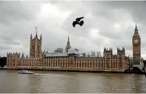  ?? PHOTO: REUTERS ?? Birds fly past the Houses of Parliament, in central London. Britain’s parliament was hit by a cyber attack in which hackers tried to access email accounts, politician­s and officials said.