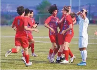 ?? ADOLPHE PIERRE-LOUIS/JOURNAL ?? Sandia’s boys celebrate after scoring a goal against La Cueva during their semifinal game in the Albuquerqu­e Metro Championsh­ips.