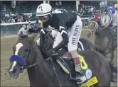  ?? JEFF ROBERSON - STAFF, AP ?? Jockey John Velazquez rides Authentic to win the 146th running of the Kentucky Derby at Churchill Downs, Saturday, Sept. 5, 2020, in Louisville, Ky.