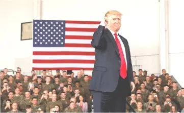  ??  ?? Trump pumps his fist after speaking at Marine Corps Air Station Miramar in San Diego, California, US. —Reuters photo