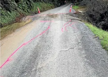  ??  ?? A developing slip about 50m high and 120m across has forced the closure of Matiri West Bank Rd, near Murchison. A ford is being developed across the Matiri River north of the slip.