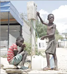  ?? Photo: Emmency Nuukala ?? Water is life… Residents of Windhoek fetch water from a communal tap.