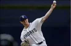  ??  ?? san Diego Padres starting pitcher Eric Lauer works against a Los angeles Dodgers batter during the first inning of a baseball game on Tuesday in san Diego. AP PHOTO/GrEGOry BUll