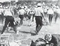  ?? AP FILE PHOTO ?? WILD IN THE STREETS: Chicago police attack protesters in Grant Park during the 1968 Democratic convention.