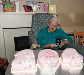  ??  ?? Anna Maguire celebratin­g her 104th birthday with a cake sent to her by McCloskey’s bakery Drogheda in Boyne Valley Nursing Home Dowth