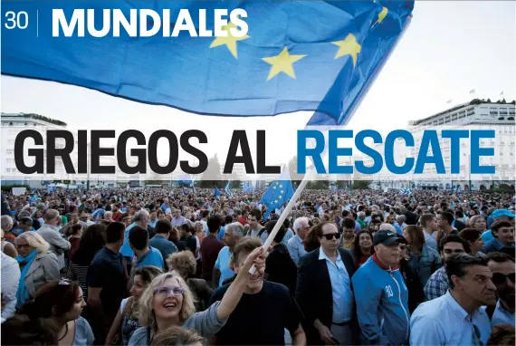  ??  ?? Miles de personas, algunas ondeando banderas de Grecia y de la Unión Europea, reclamaron ayer que el país siga dentro de la eurozona.