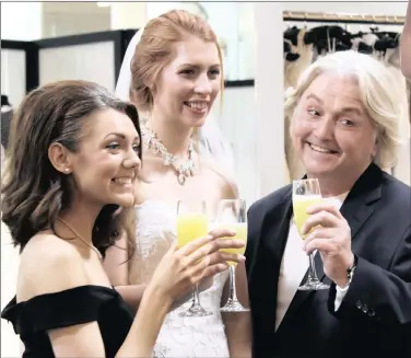  ?? Say Yes to the Dress. ?? MAKING DREAMS COME TRUE: David Emanuel, far right, is the host of the UK version of