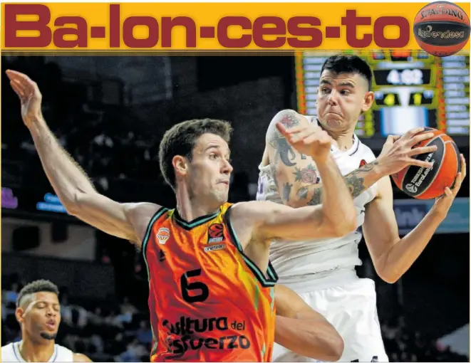  ?? ?? Xabi López-Arostegui, alero del Valencia Basket, trata de frenar la acometida de Gabriel Deck, clave en el triunfo del Real Madrid.