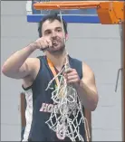  ??  ?? SUCCESS: Horsham Hornets playing coach Cam Bruce cuts the net after winning last season’s north-west conference title.