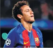  ??  ?? Barcelona's Brazilian forward Neymar reacts to their disqualifi­cation by Juventus at the Camp Nou stadium.