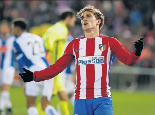  ??  ?? NEGADO. Lo intentó, pero Griezmann ante el Espanyol se topó con Diego López y con el larguero. Otro partido más, se fue de vacío.