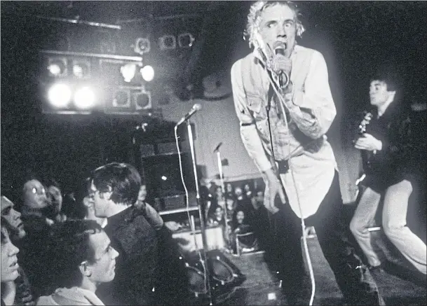  ??  ?? Johnny Rotten on stage with the Sex Pistols in 1976 on their Anarchy In The UK tour, left, and, above, John Lydon in London for the High Court case he lost