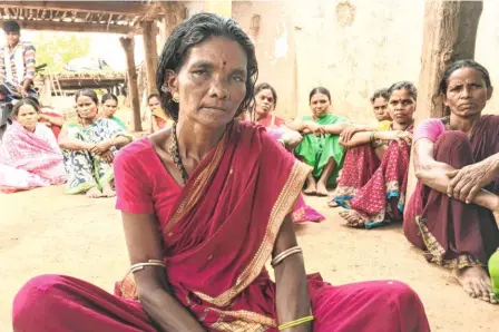  ??  ?? PENDRUM ASUBAI, seen here along with other women of Mysampet. She has been hearing about relocation from 2012, when she moved here.