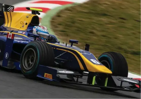  ?? SEBASTIAN ROZENDAAL ?? Toronto racing driver Nicholas Latifi tests the French DAMS team’s GP2 car at the Circuit de Barcelona-Catalunya.