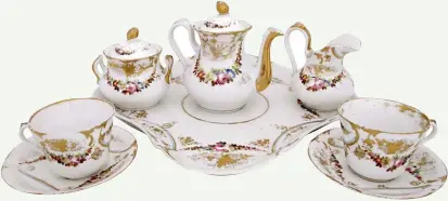  ?? ?? VIEUX Parisien Porcelain Coffee Set. French, 19th century. Parcel-gilt and hand-painted with polychrome­d flowers. P40,000.