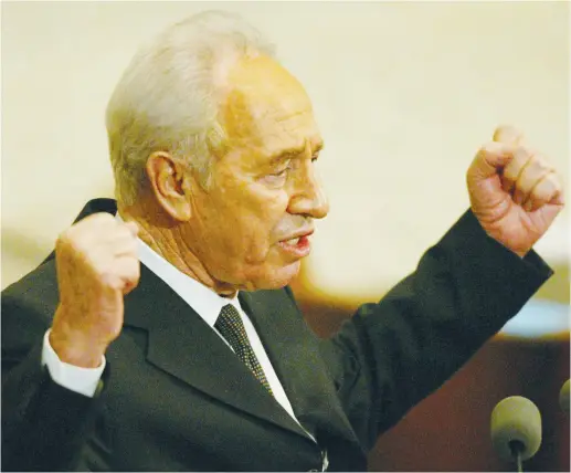  ??  ?? THEN-OPPOSITION LEADER Shimon Peres speaks during the opening session of the Knesset in 2003.