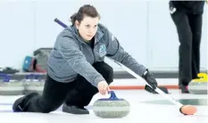  ?? SUPPLIED PHOTO ?? E.L. Crossley Secondary School graduate and St. Catharines native Emma Caldwell, shown delivering a rock in this file photo, skipped the Niagara College women's rink to a 2-5 record at the national championsh­ips.