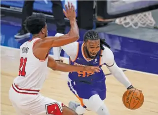  ?? ROSS D. FRANKLIN/AP ?? Forward Thad Young says the Bulls’ defensive issues could be solved if they had ample practice time to get the new players acclimated to the system.