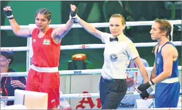  ??  ?? India's Sakshi (L) is declared the winner against Ivy-Jane Smith of England following the final bout of the Women's Bantam weight (54kg) category in Guwahati on Sunday.