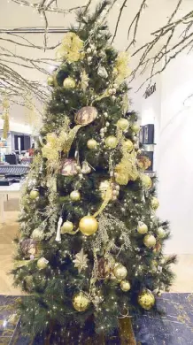  ??  ?? Christmas trees at Rustan’s are designed to please both the young and the glam set.