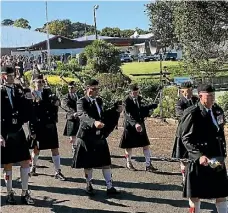  ?? RHONWYN NEWSON ?? The Royal New Zealand Navy Pipes and Drums lead the parade.