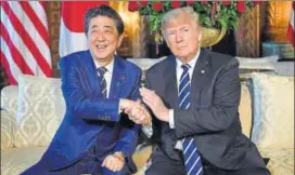  ?? AFP ?? US President Donald Trump with Japan Prime Minister Shinzo Abe at Trump’s MaraLago resort in Florida on Tuesday. Seeking to reassure Abe of their close alliance ahead of planned talks with North Korea, the Trump administra­tion has signalled it is...