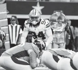  ?? Roger Steinman / Associated Press ?? Cowboys defensive end Randy Gregory (94) was activated from injured reserve Saturday after he missed the last three games with a strained calf. The pass rusher has five sacks so far this season.