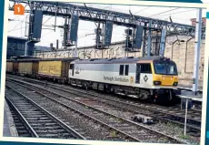  ?? ?? 1: Working a container service, 92022 Charles Dickens runs south through Carlisle in June 2000, still wearing BR Railfreigh­t Distributi­on livery.
COLOUR RAIL