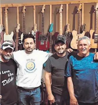  ?? CONTRIBUTE­D ?? John Reid (right) was all smiles last week after recording his song, “The Dildo Song” at Comfort Cove Sound Studio in St. John's. Also pictured are (from left) John's nephew Dean Reid, Alberta record executive Raghav Mathur and John's son Sheldon Reid.