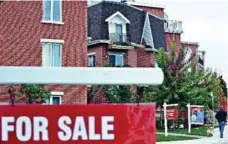  ?? AARON HARRIS/TORONTO STAR FILE PHOTO ?? The CREA said sales in August were down in nearly two-thirds of all local markets, led by the Greater Toronto Area and nearby housing markets.