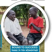  ??  ?? BOUND TO SUCCEED: Isaac in his wheelchair and, inset, with Jacob