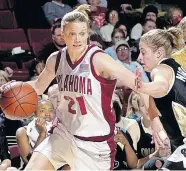  ?? [PHOTOS FROM THE OKLAHOMAN ARCHIVES] ?? Stacey Dales (21) was a two-time first-team All-American at OU, leading the Sooners to their first Final Four in 2002.