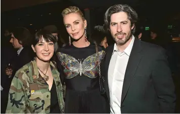  ?? (Shuttersto­ck/SIPA) ?? Screenwrit­er Diablo Cody, actress Charlize Theron and director Jason Reitman.