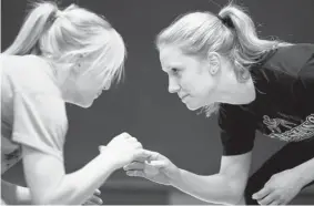  ?? GREG PENDER/The StarPhoeni­x file photo ?? University of Saskatchew­an wrestler Annie Monteith, right, is a medal hopeful in the
Canada West championsh­ip, held this weekend at the U of S Education Gym.