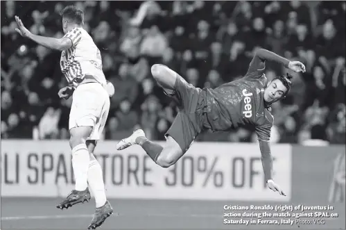  ?? Photo: VCG ?? Cristiano Ronaldo (right) of Juventus in action during the match against SPAL on Saturday in Ferrara, Italy