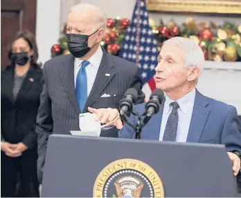  ?? ABACA PRESS ?? Anthony Fauci, right, joined by President Joe Biden and Vice President Kamala Harris, discusses the omicron variant on Monday.