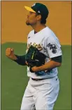  ?? JOSE CARLOS FAJARDO — STAFF ?? A’s pitcher Joakim Soria pumps his fist after second baseman Tommy La Stella completes a double play in the eighth inning Thursday.