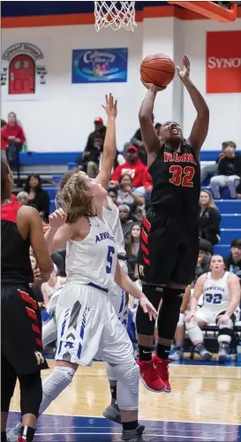  ?? Steven Eckhoff / RN-T ?? Rome High’s Tamiya Griffin (32) takes a shot in front of Armuchee’s Grace Stanley (5) during a Christmas Tournament game Tuesday at Georgia Highlands College.