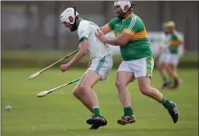  ??  ?? Patrick Mellon of Arklow Rocks is challenged by Vincent Quigley.