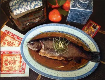  ?? Tribune News Service ?? Cantonese poached fish with ginger and green onions.