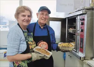  ?? TIFFANY MAYER SPECIAL TO THE ST. CATHARINES STANDARD ?? Bernadine and Osvaldo (Ozzie) Mucciarell­i started baking and selling banana bread at their St. Catharines Avondale 20 years ago. Today, their quick breads make the store a destinatio­n.