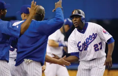  ?? PAUL CHIASSON/THE CANADIAN PRESS ?? Former Expos star Vladimir Guerrero might just be the first in his family in the Canadian hall if his son stays ahead of him on the learning curve.