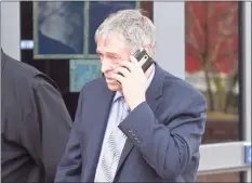  ?? H John Voorhees III / Hearst Connecticu­t Media ?? Bruce Bemer leaves state Superior Court in Danbury on April 2, 2019.